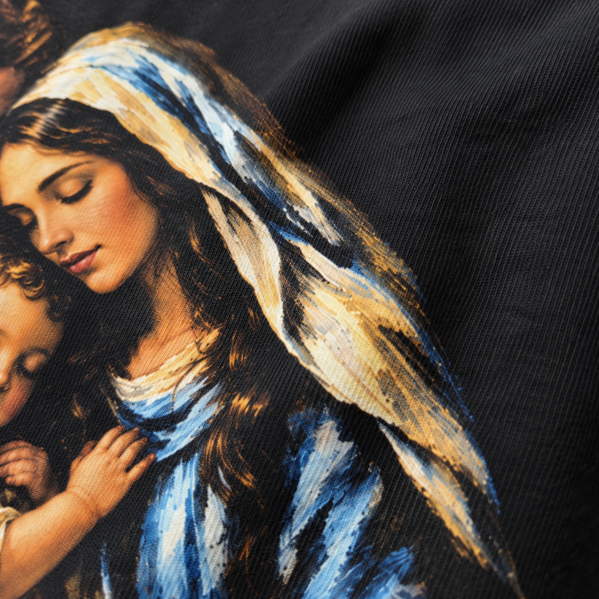 Textura da camiseta com a estampa Sagrada Família