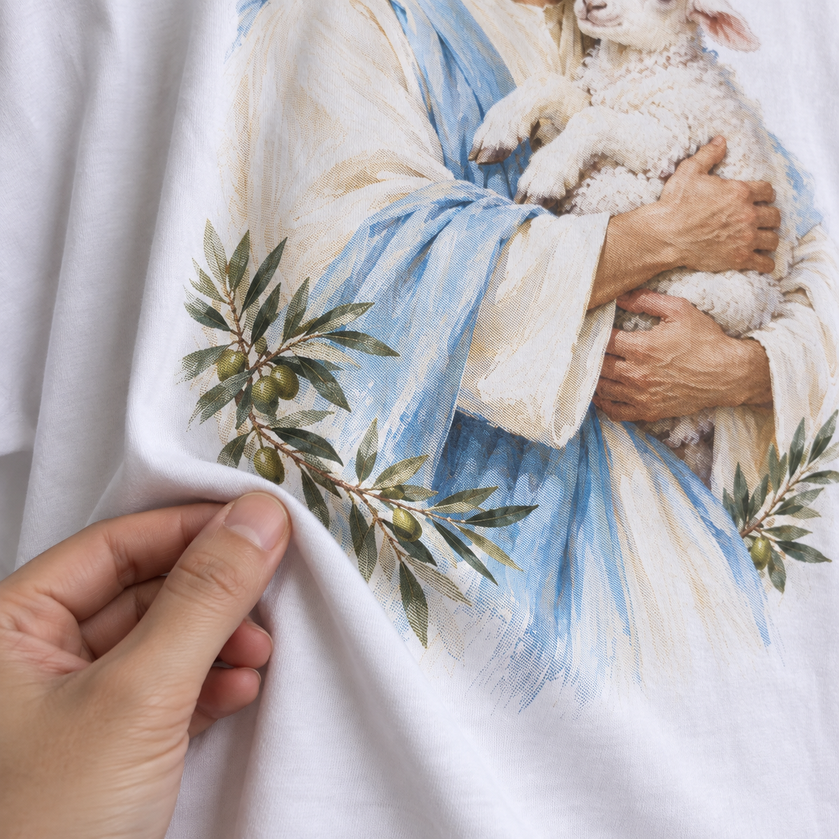 Tecido da camiseta branca Jesus, Bom Pastor em movimento